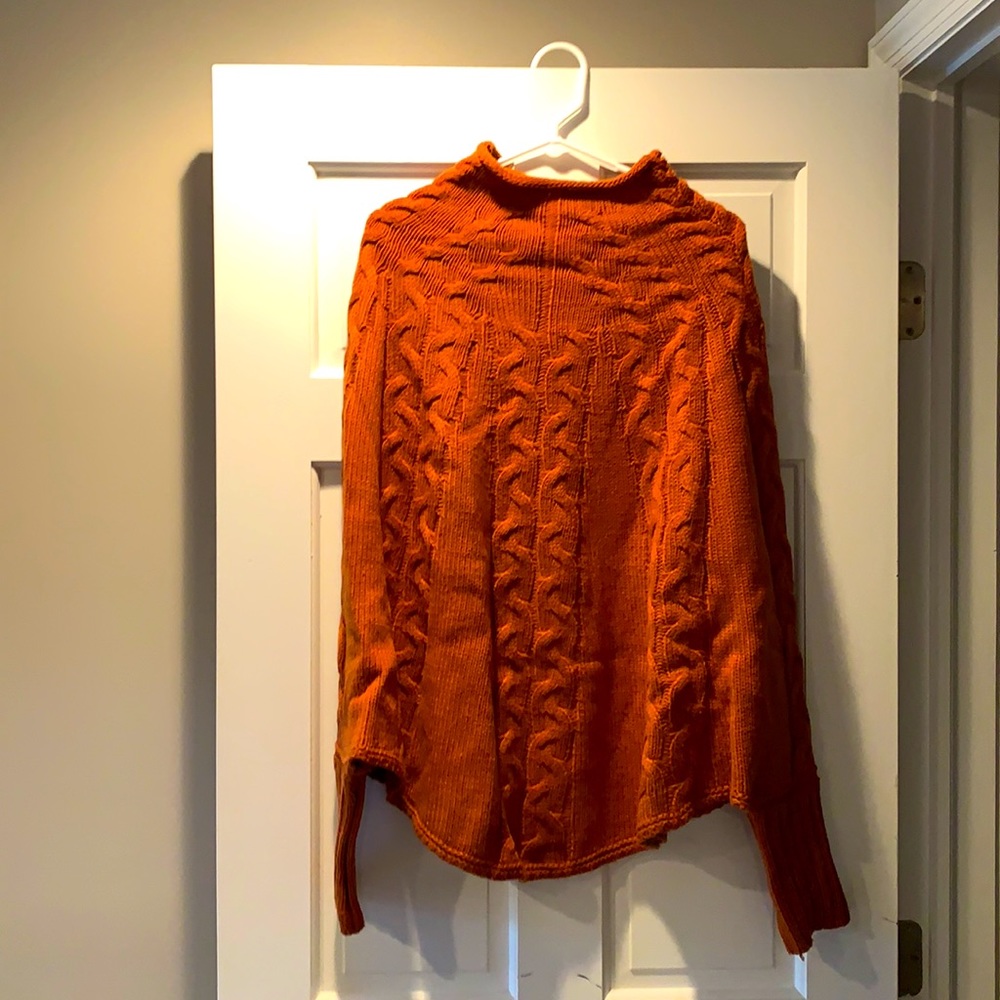 Orange poncho sweater